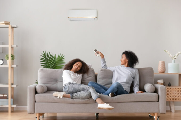 Do air conditioners help clean up indoor air pollution?